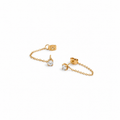 Gold chain earring with embedded diamonds on a white background