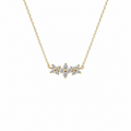 Gold necklace with a diamond pendant on a white background
