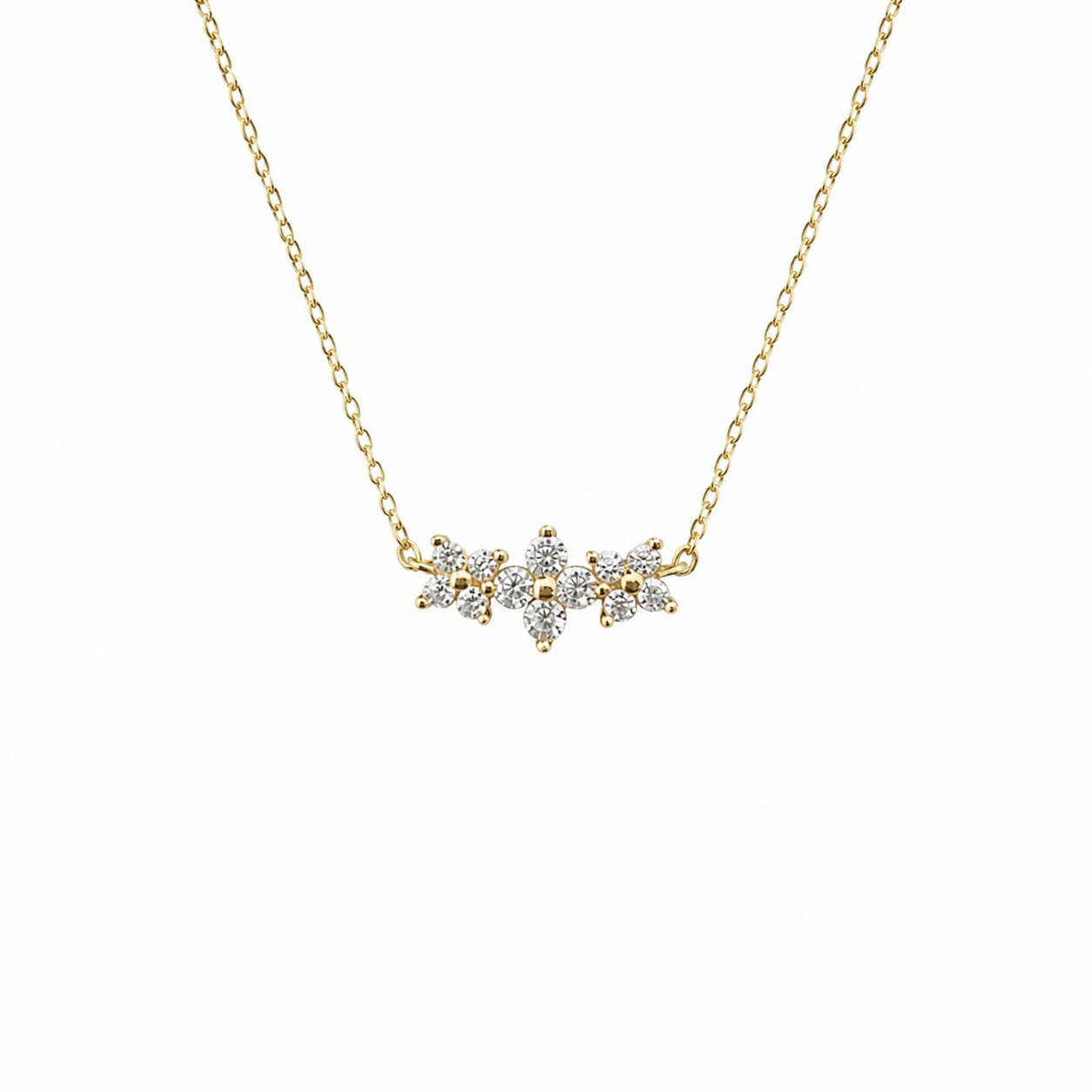 Gold necklace with a diamond pendant on a white background