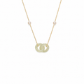 Gold necklace with a jade pendant on a white background