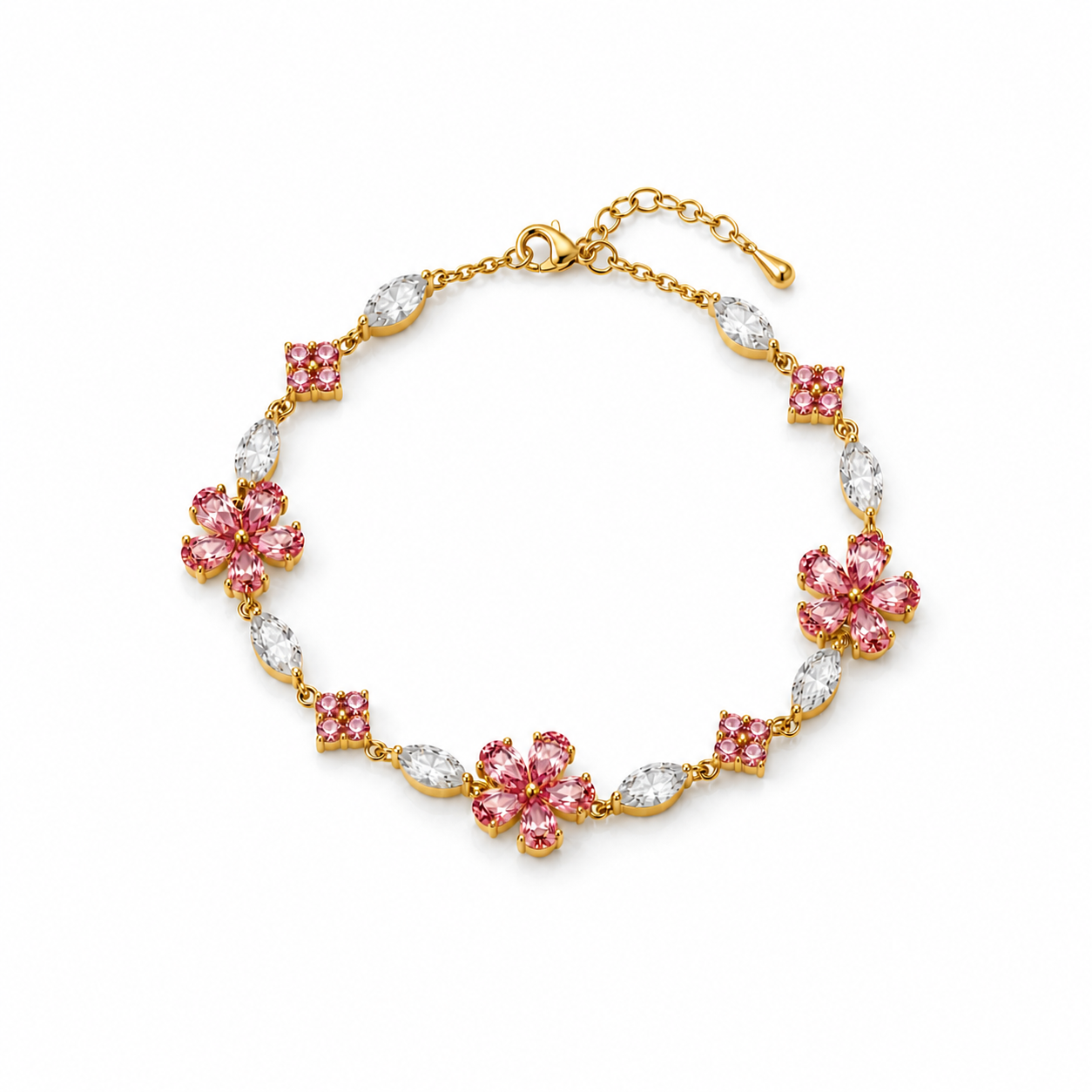 Gold bracelet with pink and clear gemstones on a white background